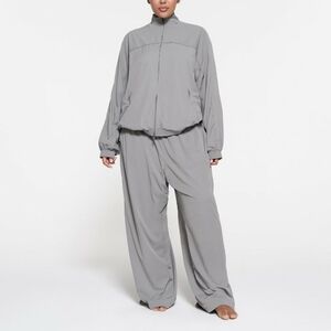 SKIMS track suit woven nylon in XL | pacific | jacket and pants